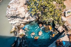 a group of people in a pool