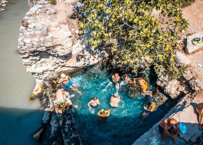 a group of people in a pool